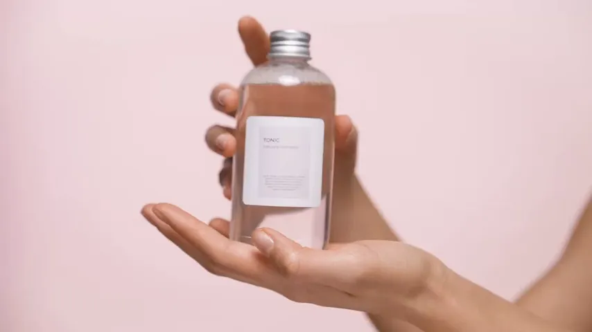 Interface showing multiple videos being processed simultaneously with batch background removal